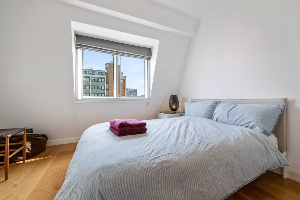 Bright and cozy bedroom in a London property, ideal for residential lettings or holiday lets agency clients. MX Lettings Property Managers London
