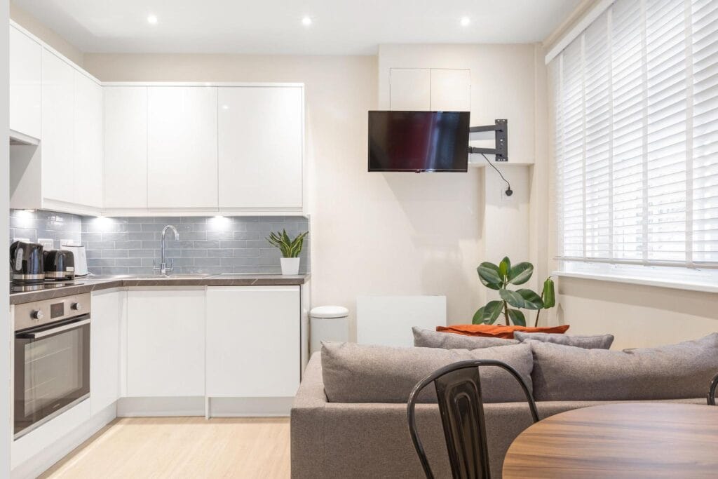 Modern kitchen and living area in a London property managed by a holiday lets agency, ideal for residential lettings. MX Lettings Property Managers London